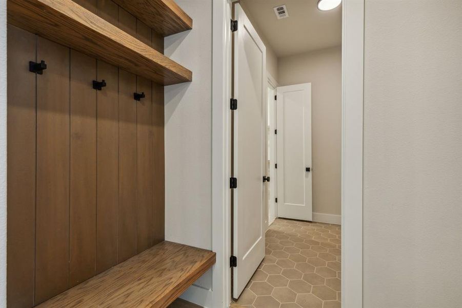 Mudroom featuring tile patterned floors