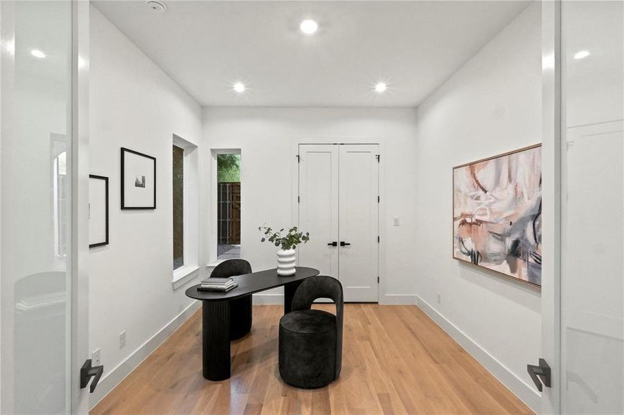 Office space featuring light hardwood / wood-style flooring