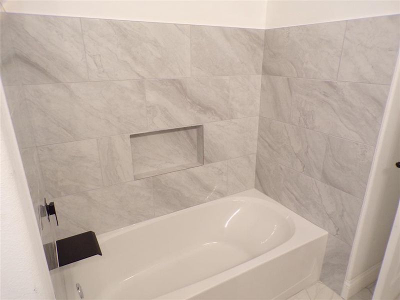 Bathroom featuring tile patterned flooring