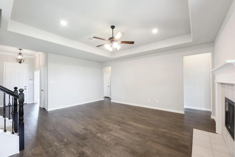 Family Room | Concept 2379 at Abe's Landing in Granbury, TX by Landsea Homes