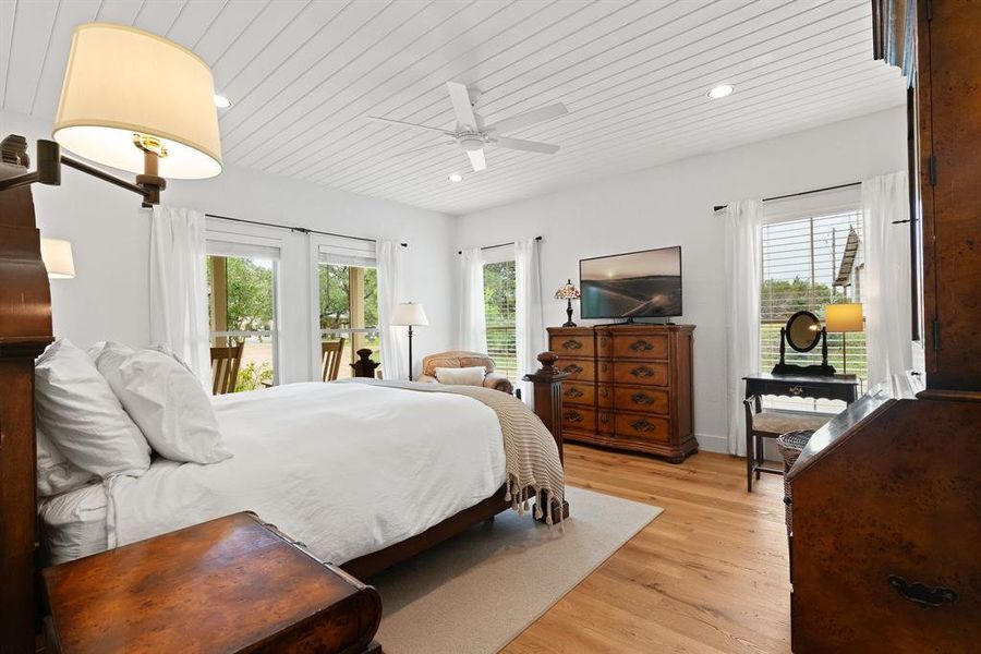 The primary bedroom in home number one offers tons of space and natural light