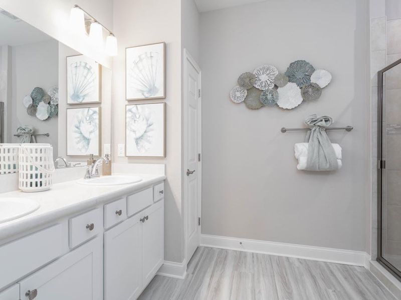 Step away into your relaxing en-suite owner`s bath - Shelby home plan by Highland Homes