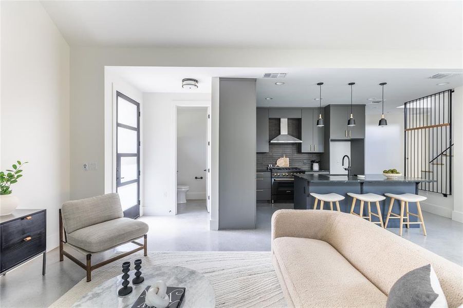 Spacious living area blends seamlessly with the kitchen and dining nook.