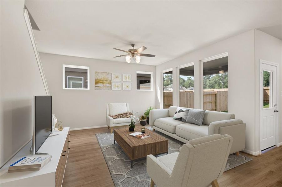 Your family room has ample space to entertain family and friends. This space features beautiful floors, fresh paint, ceiling fan with lighting, and high ceilings.