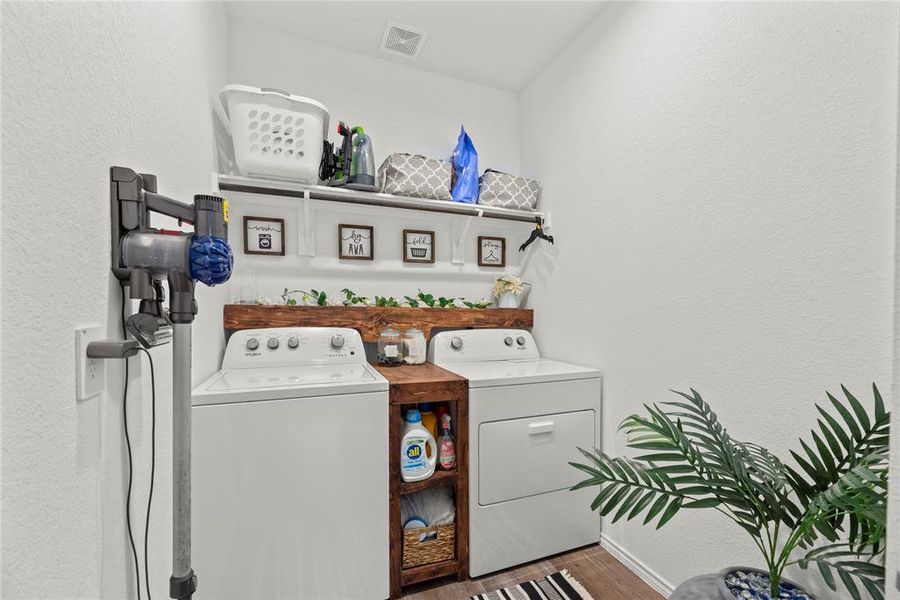 This well-appointed space includes ample storage and efficient organization, making laundry day a breeze while keeping your home tidy and functional.