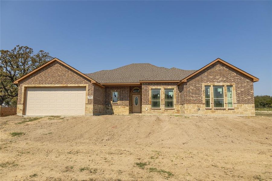 Brand new custom built home on gorgeous 1-acre.  Country living close to the city.