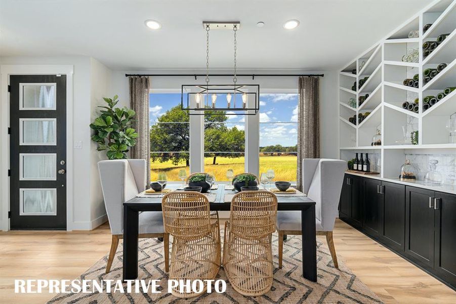 Designed with entertaining in mind, you'll enjoy fantastic dinner parties or cozy family gatherings in this lovely dining room.  REPRESENTATIVE PHOTO