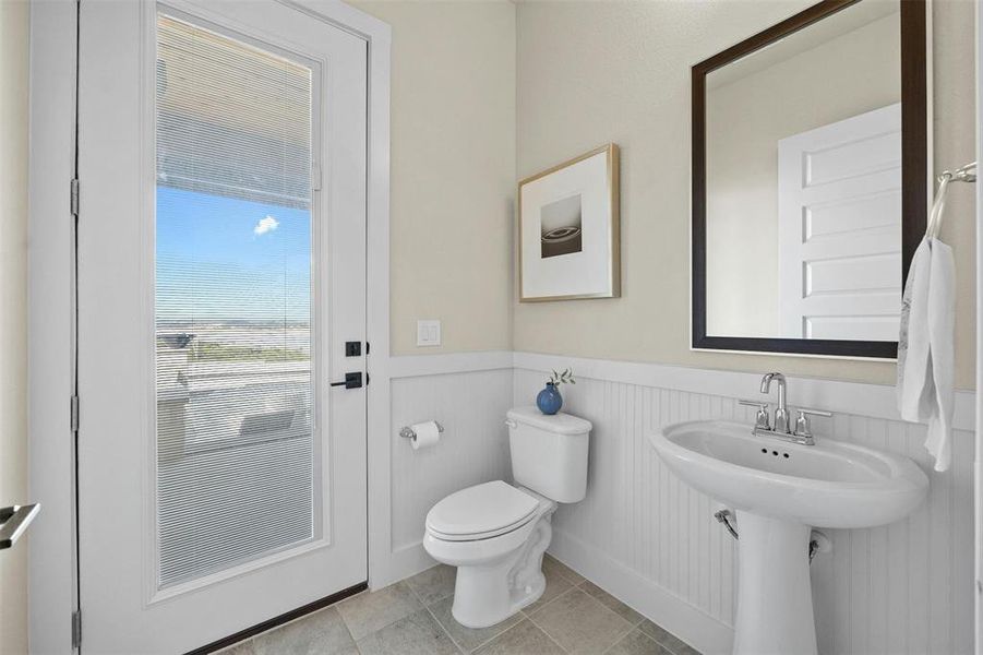 Powder room with outdoor entrance for your guests using the pool.