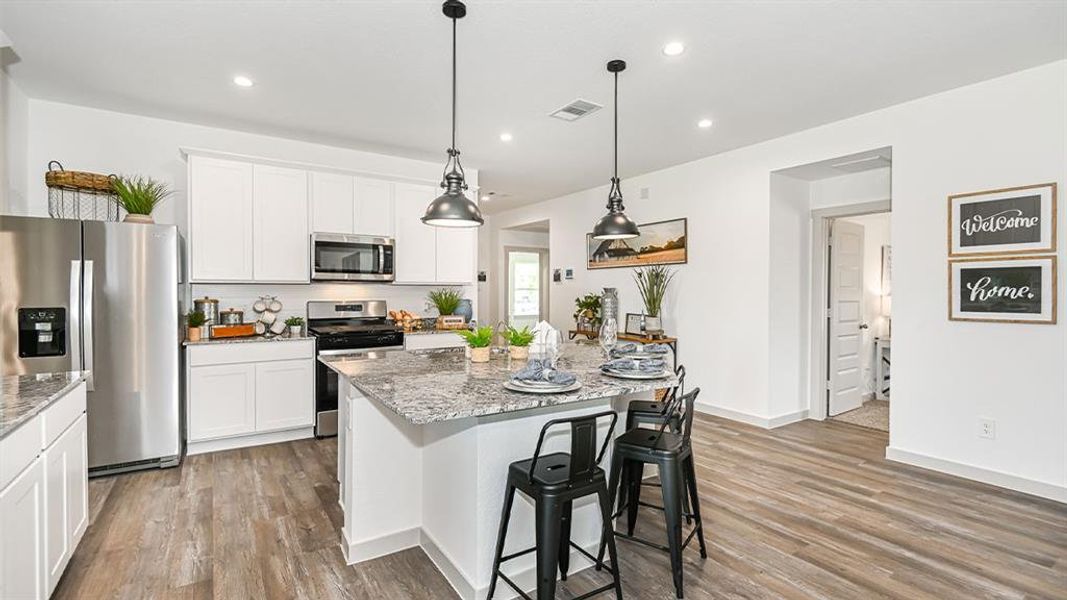 Wonderful Stainless Steel Whirlpool appliances include microwave, dishwasher & gas range. **Image Representative of Plan Only and May Vary as Built**