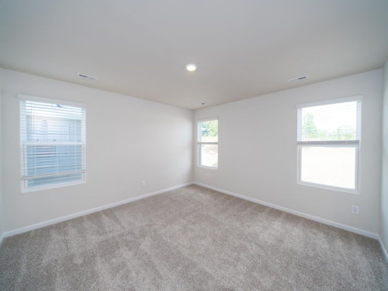 Primary Bedroom in the Dallas Floorplan at Childers Park.