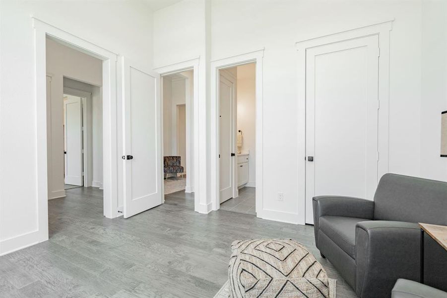 Bedroom with light hardwood / wood-style floors