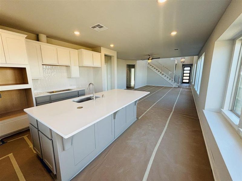 View of Kitchen & Family