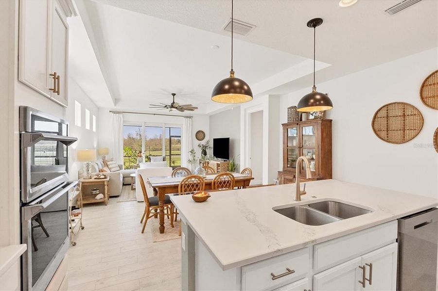 Kitchen opens to great room.