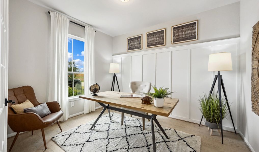 Private home office in lieu of dining room with French doors