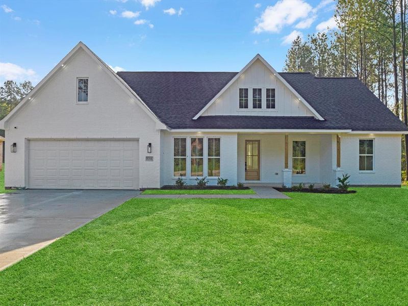 Step into this charming modern farmhouse with its inviting white brick exterior and welcoming porch. The oversized windows, under soffit lighting, and discreet security camera add both style and functionality to this beauty!