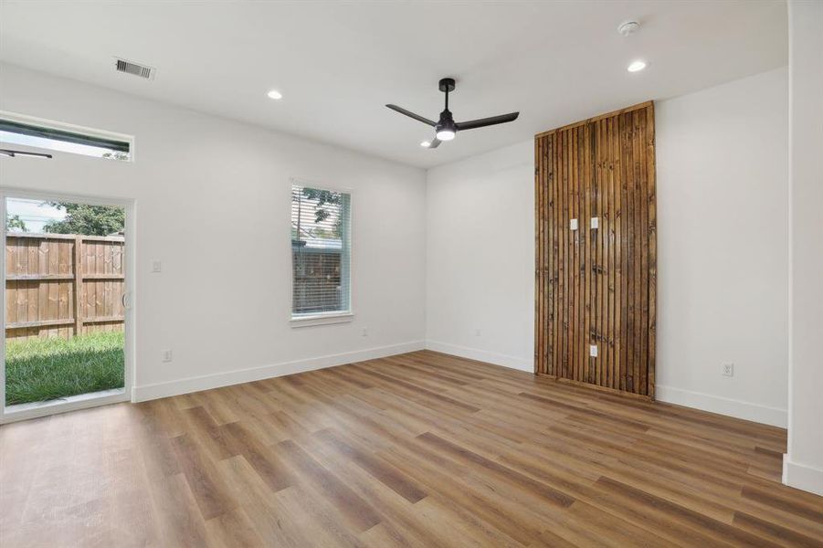 Alternative view of back yard and living room wall detailing