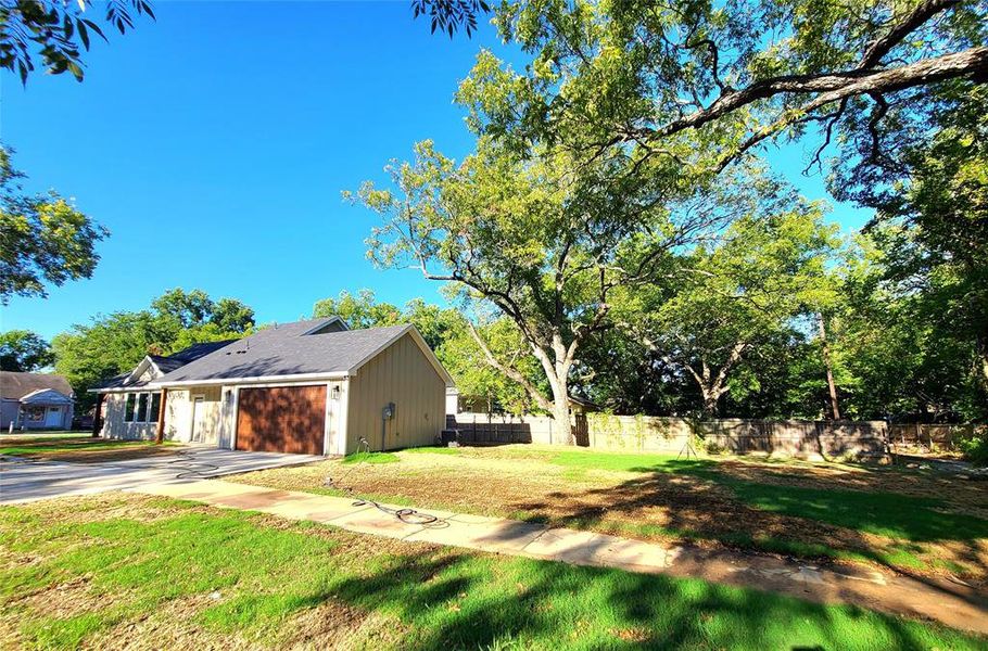 View of yard and garage