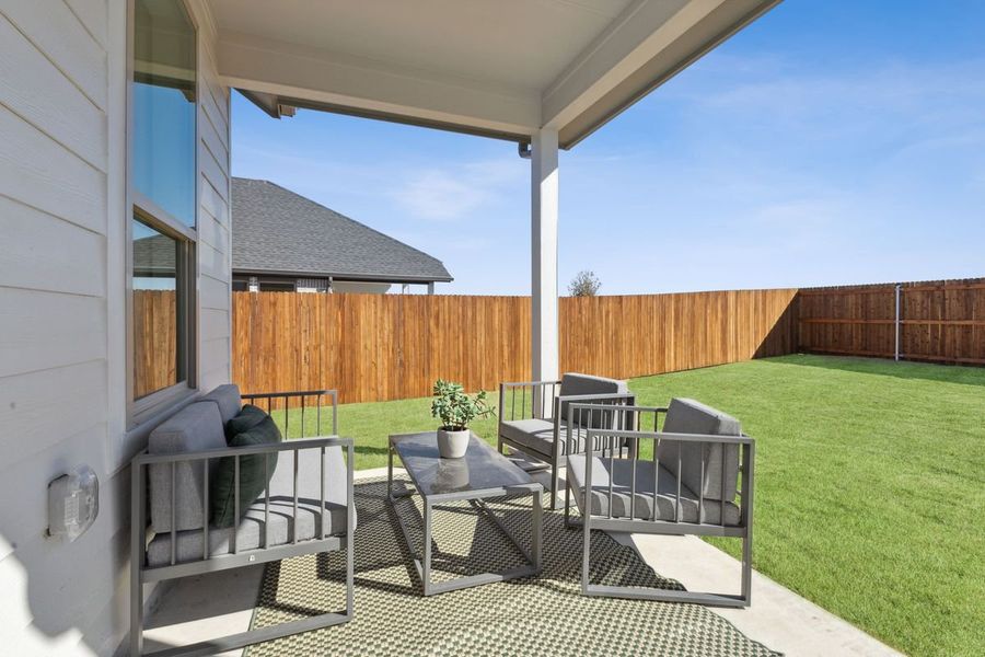 Covered Patio in the Winters home plan by Trophy Signature Homes – REPRESENTATIVE PHOTO