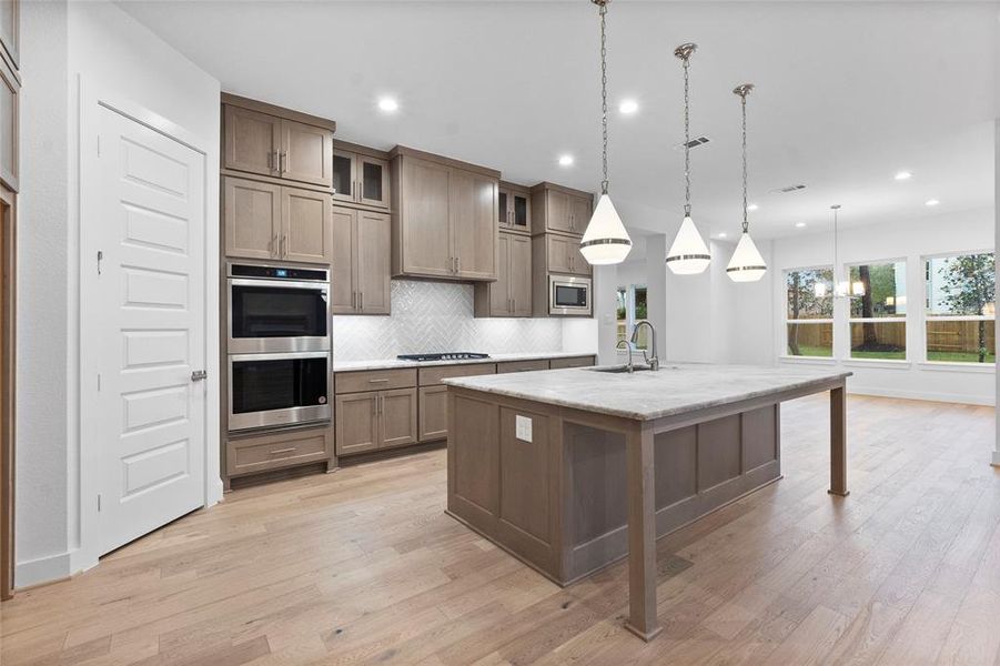 Stacked Cabinets, Walk-in Pantry, and Double Ovens