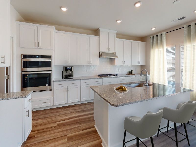 The large kitchen island makes meal prep a breeze.