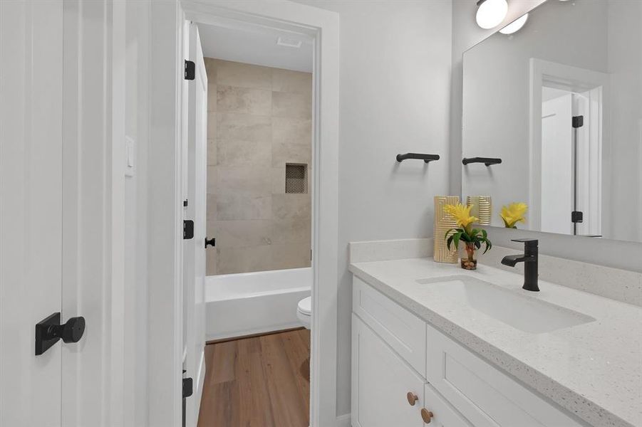 Full bathroom*Picture from another home built by Builder of exact floorplan