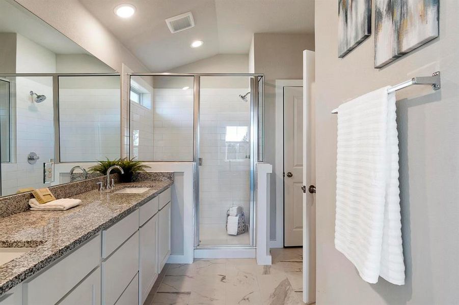 primary bathroom with large walk-in shower