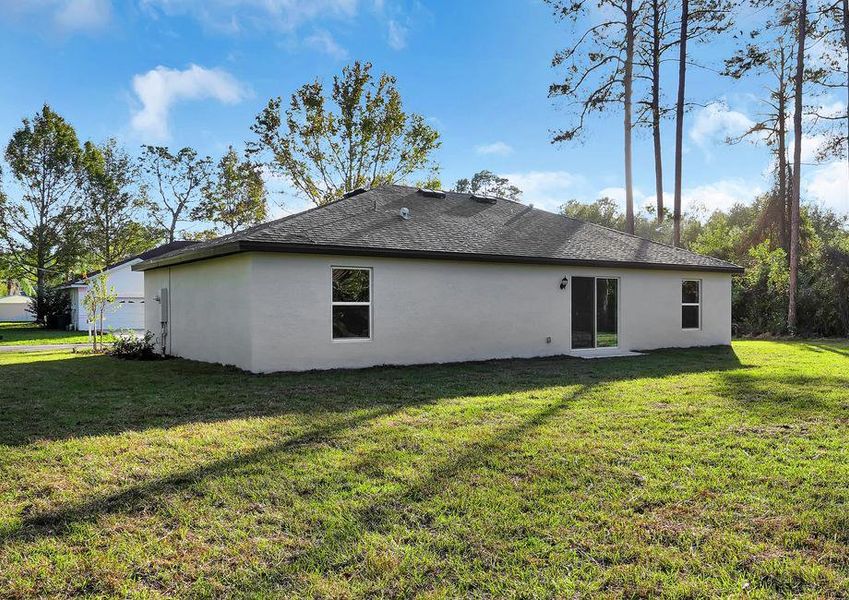 Enjoy a sliding glass door that opens the family room up to the backyard