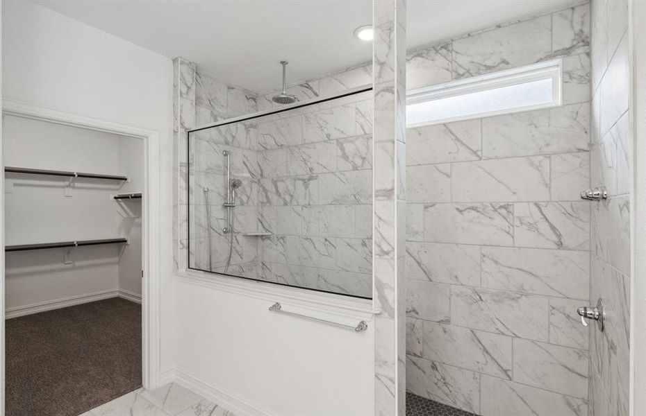 Oversized shower in owner's suite *real home pictured