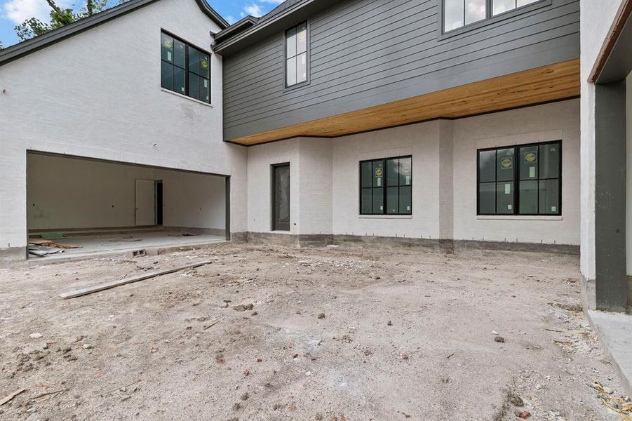 Courtyard in between your first and second garages.