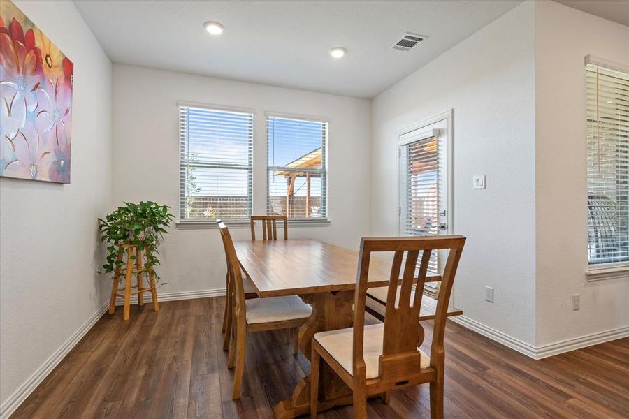 Dining room featuring dark hardwood / wood-style flooring