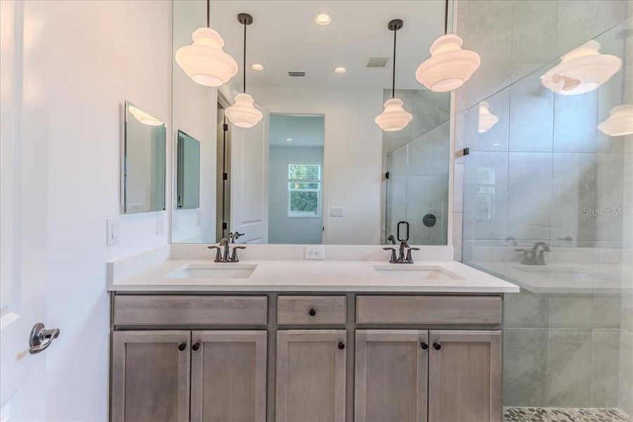 Master Bathroom with Tall Cabinet & Dual Sinks