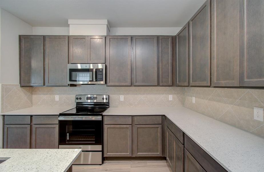 Spacious kitchen with tons of cabinets!