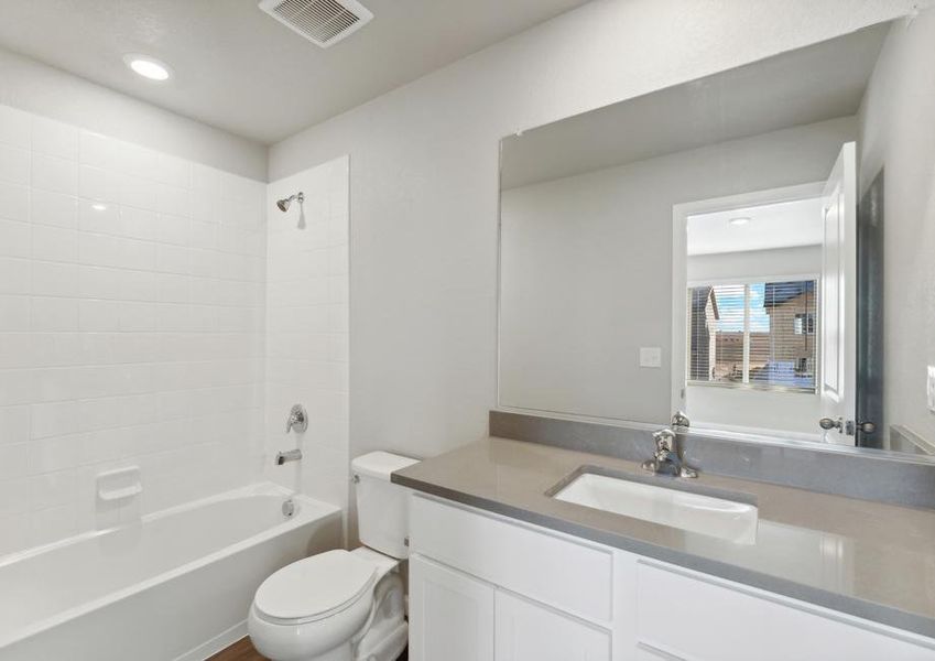 The master bathroom has a tub/shower combo.