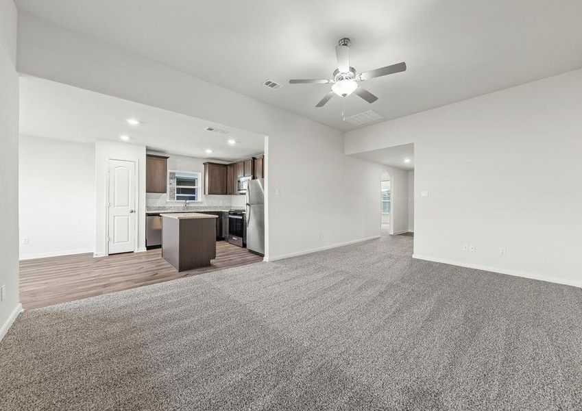 The kitchen sits right next to the dining room and family room.