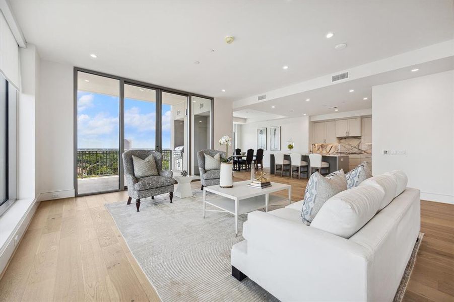 The kitchen opens up nicely to the family room and the outdoor balcony provides additional views of the skyline.