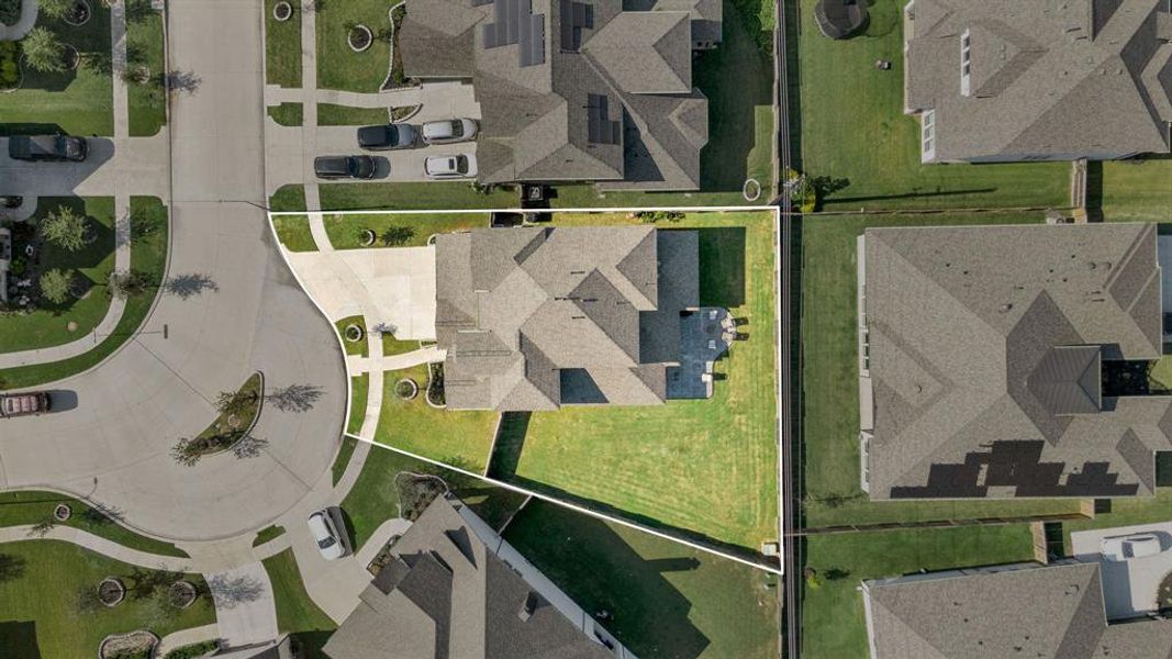 Amazing aerial shot of this gorgeous Perry home situated on a quiet cul-de-sac street in the sought after community of Fulbrook on Fulshear Creek zoned to Lamar Consolidated ISD. Lush landscaping, well manicured front lawn and a wonderful back patio, perfect to set up an outdoor sitting area and enough room for a pool!