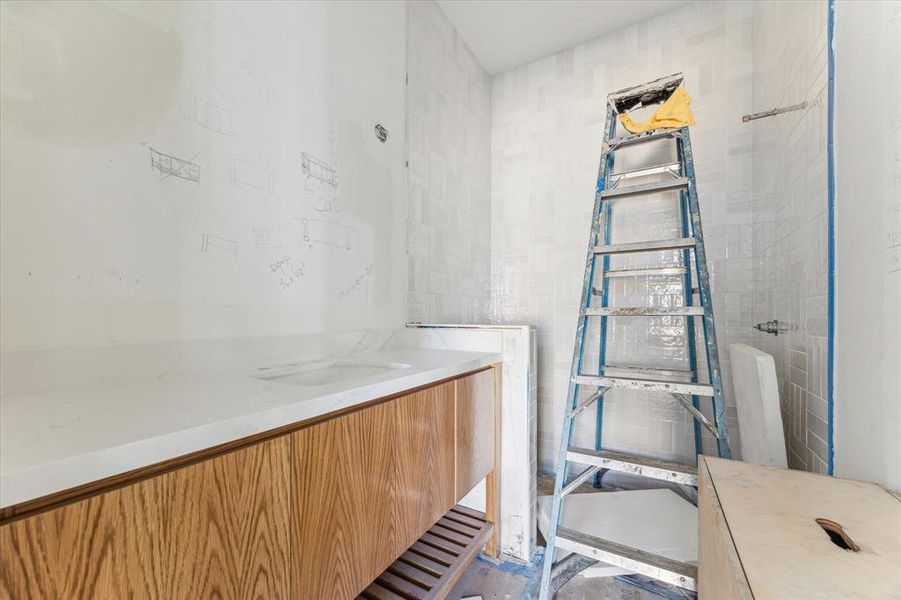 Progress Picture of first floor full bathroom w/ shower. This could be a future pool bath or guest bathroom (adjacent to flex/game room).