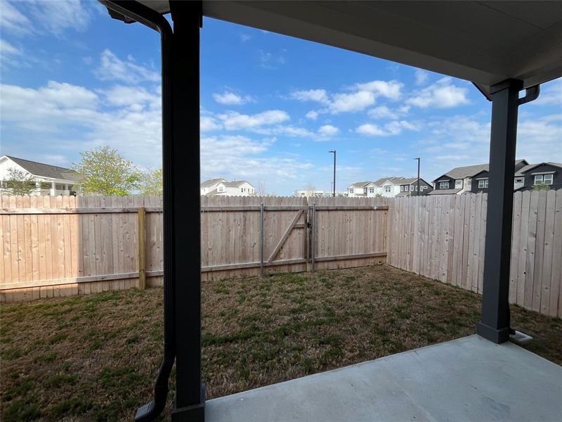 Large covered patio in private backyard