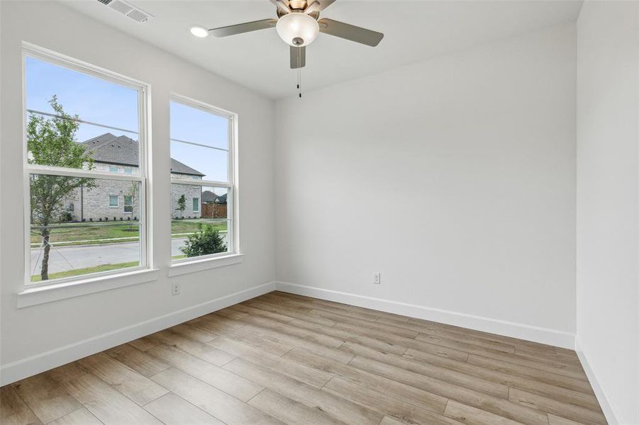 This light filled flex space makes a perfect home office or play room!