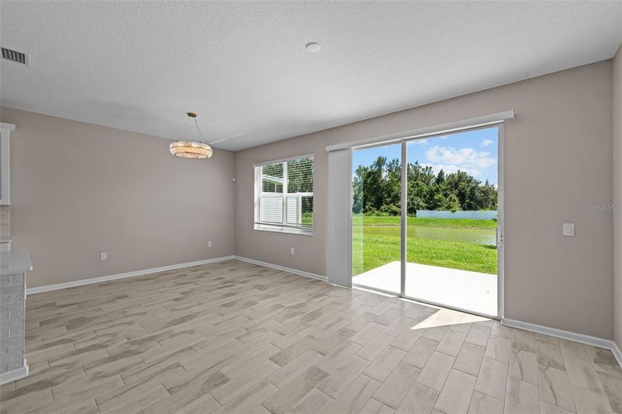 Kitchen Dining Area and Patio with Water View