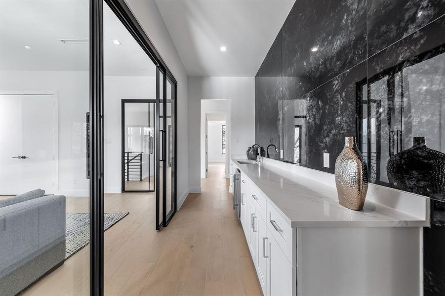 Bathroom featuring vanity and hardwood / wood-style floors