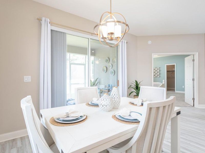 The sunny and open cafe area is perfect for all meals - Shelby home plan by Highland Homes