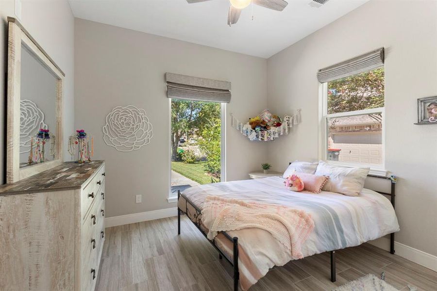 Bedroom #1 provides two windows with great natural lighting, automatic blinds, large closet, and tile floors.