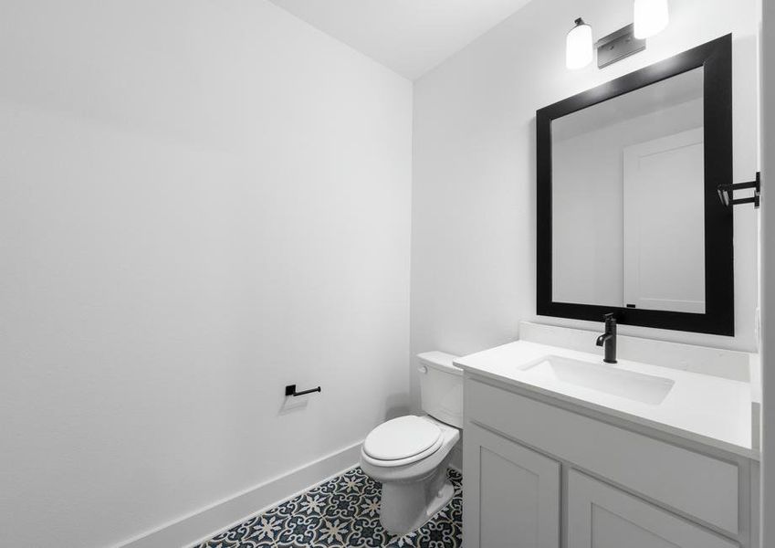 The secondary bathroom has a large vanity with plenty of cabinet space.