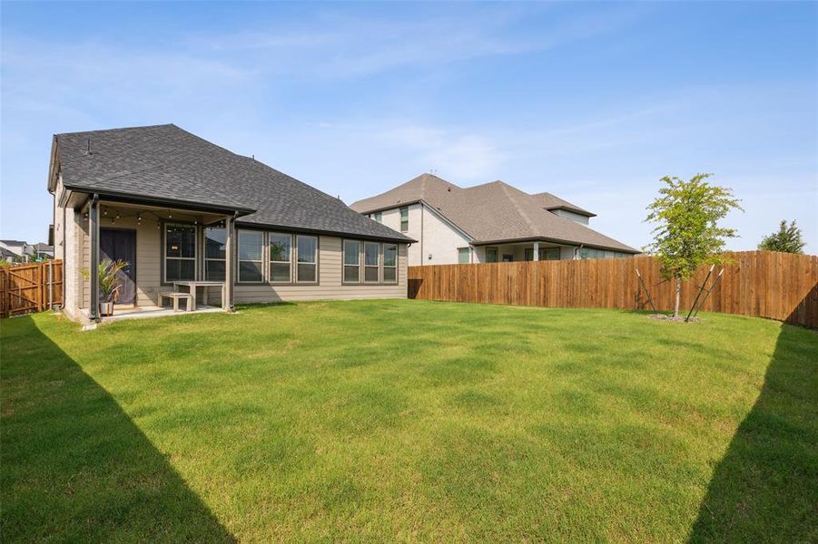 Great backyard area with space to add a playset or larger patio, endless possibilities.