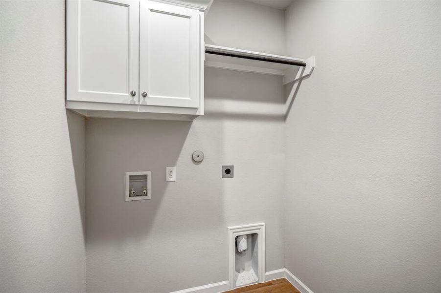 Built ins included in this upgraded laundry room