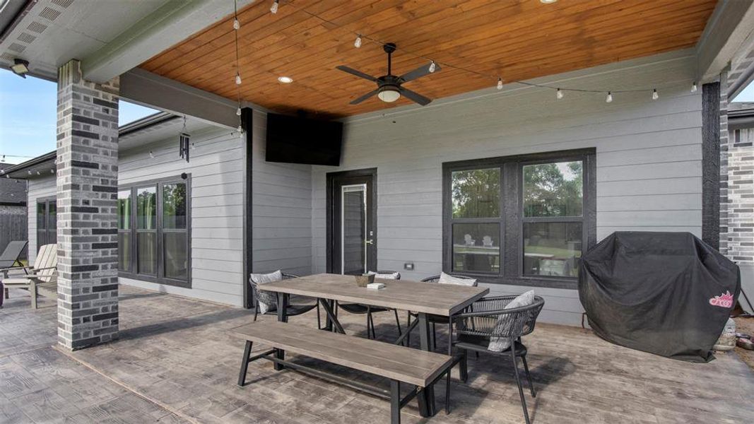 Back covered patio with stamped concrete