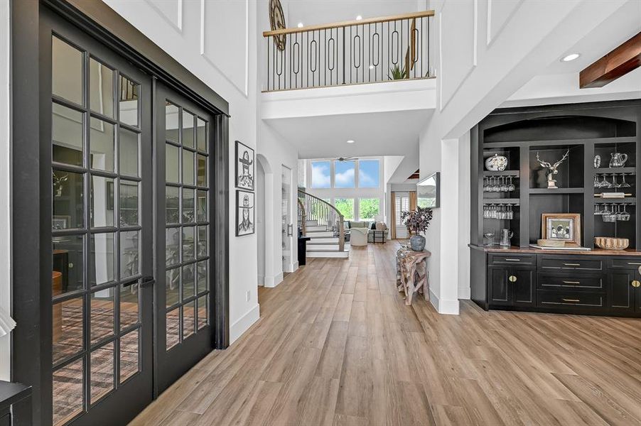 Welcoming entryway featuring elegant hardwood-style tile floors.