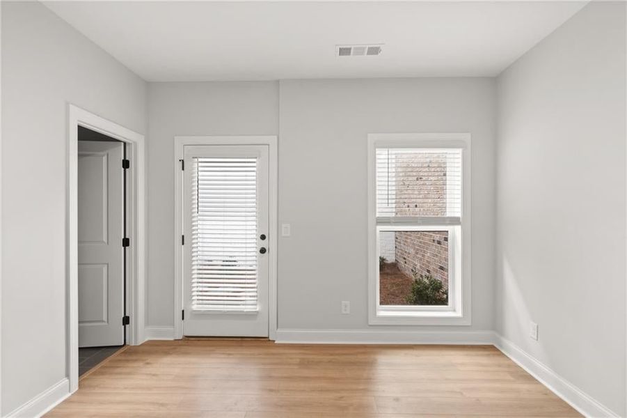 The terrace level bedroom offers flexibility and privacy, making it perfect for an in-law suite. NOT actual home. Photos of previously built Grayton floorplan.