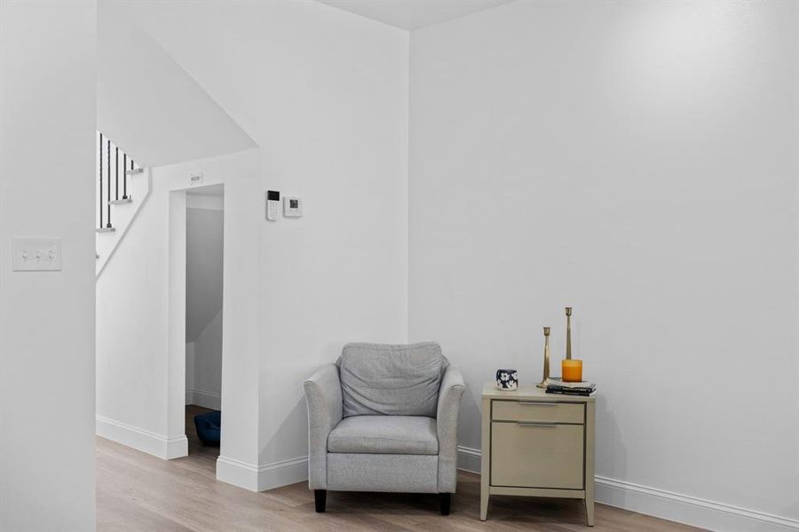 Living area featuring light wood-type flooring